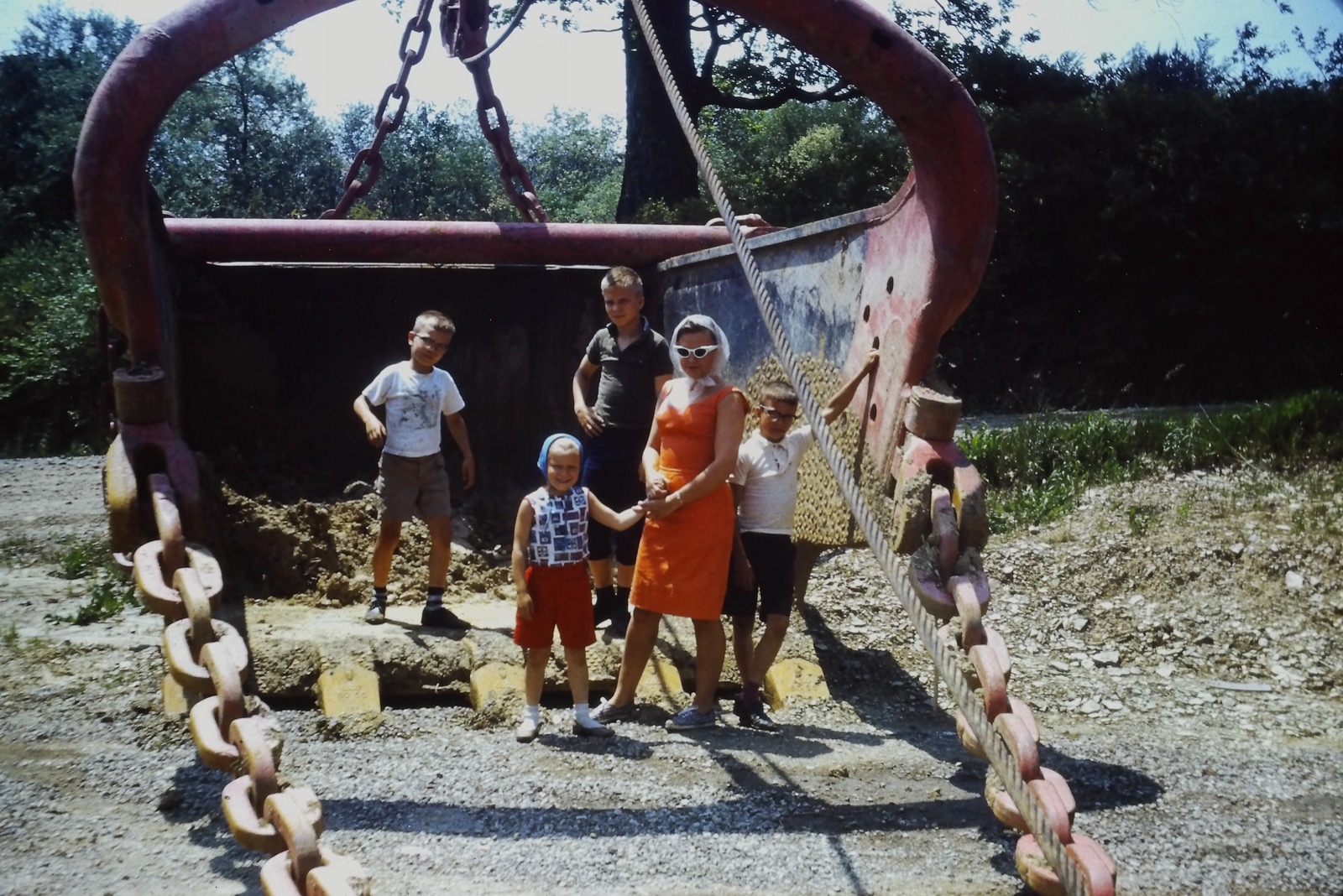 Grandma, dad, uncles, and aunt at the construction site, 1964